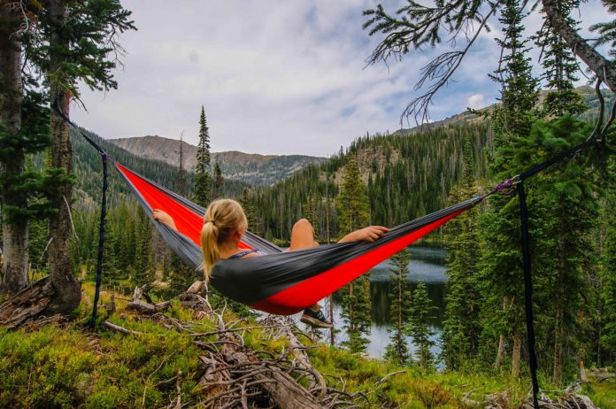 Woman red hammock-zach hammond unsplash